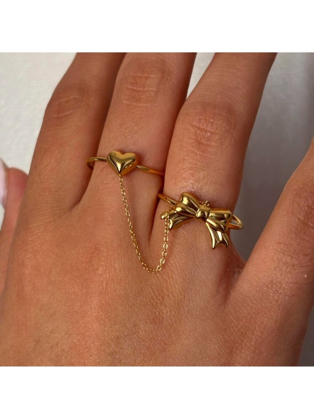 Heart and Bow Ring2 rings connected 18K Gold...